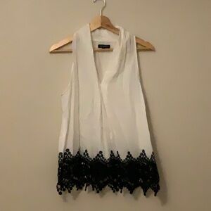 White Sleeveless Top with Black Lace Trim